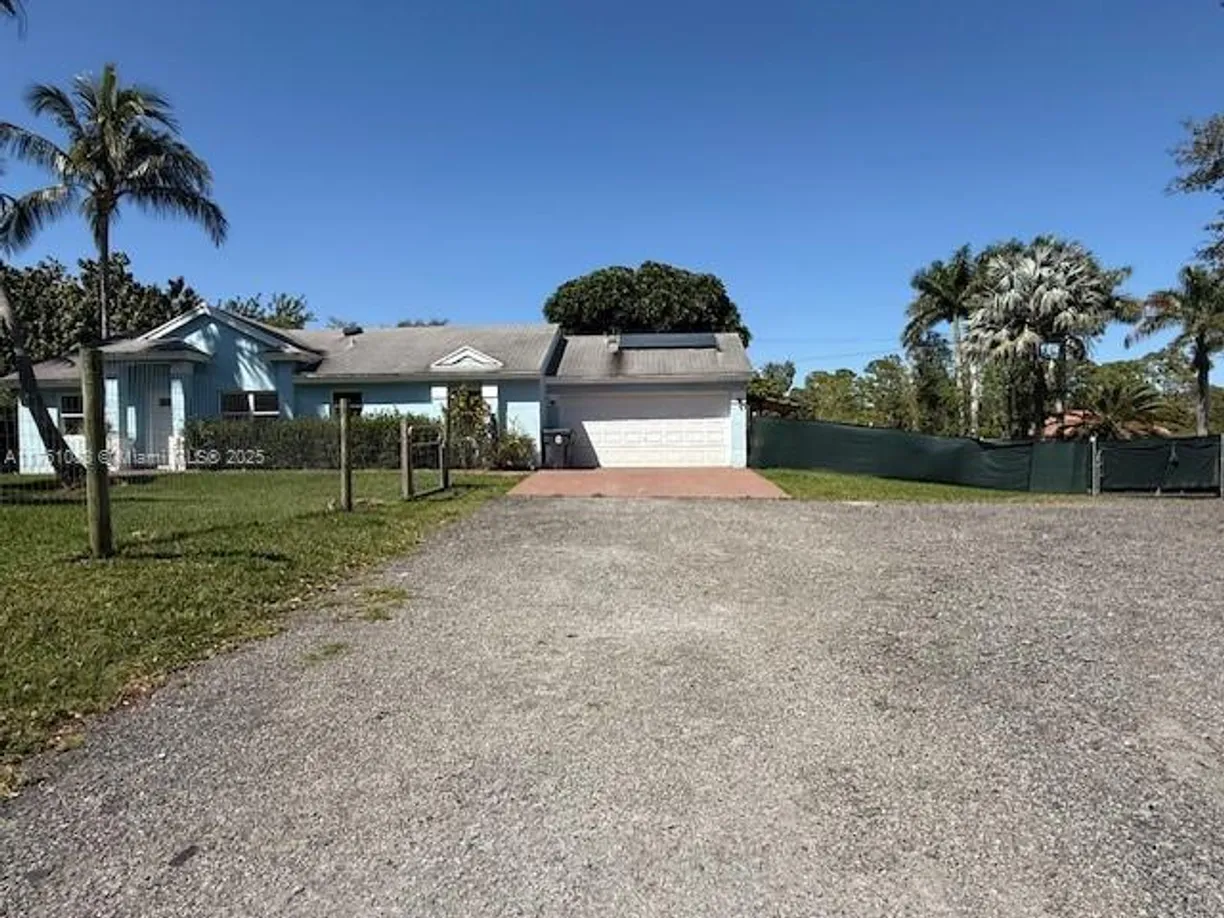 South Florida Real Estate | View 15705 N 66th Ct N | 3 Beds, 2 Baths
