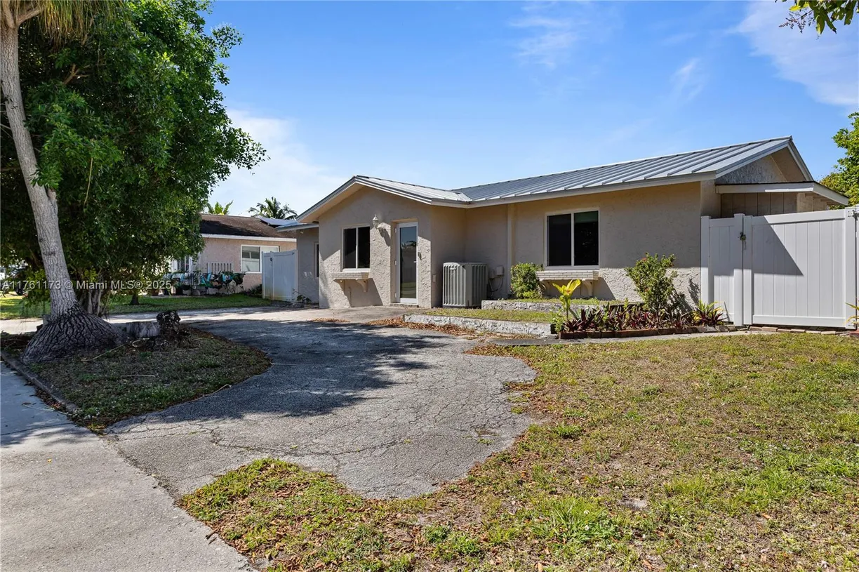 South Florida Real Estate | View 405 SW 73rd Ave | Listing