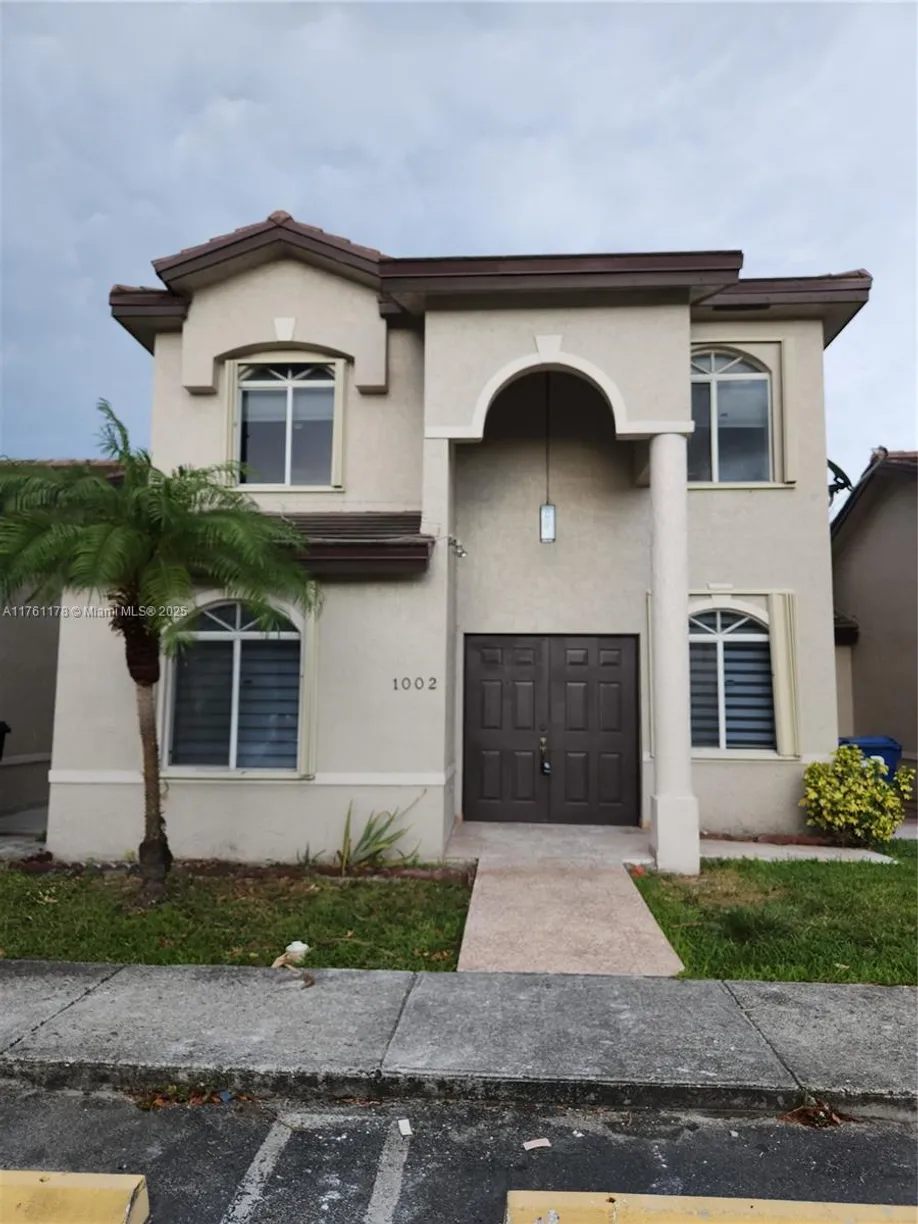 South Florida Real Estate | View 18871 NW 84th Ct, 1002 | 4 Beds, 3 Baths