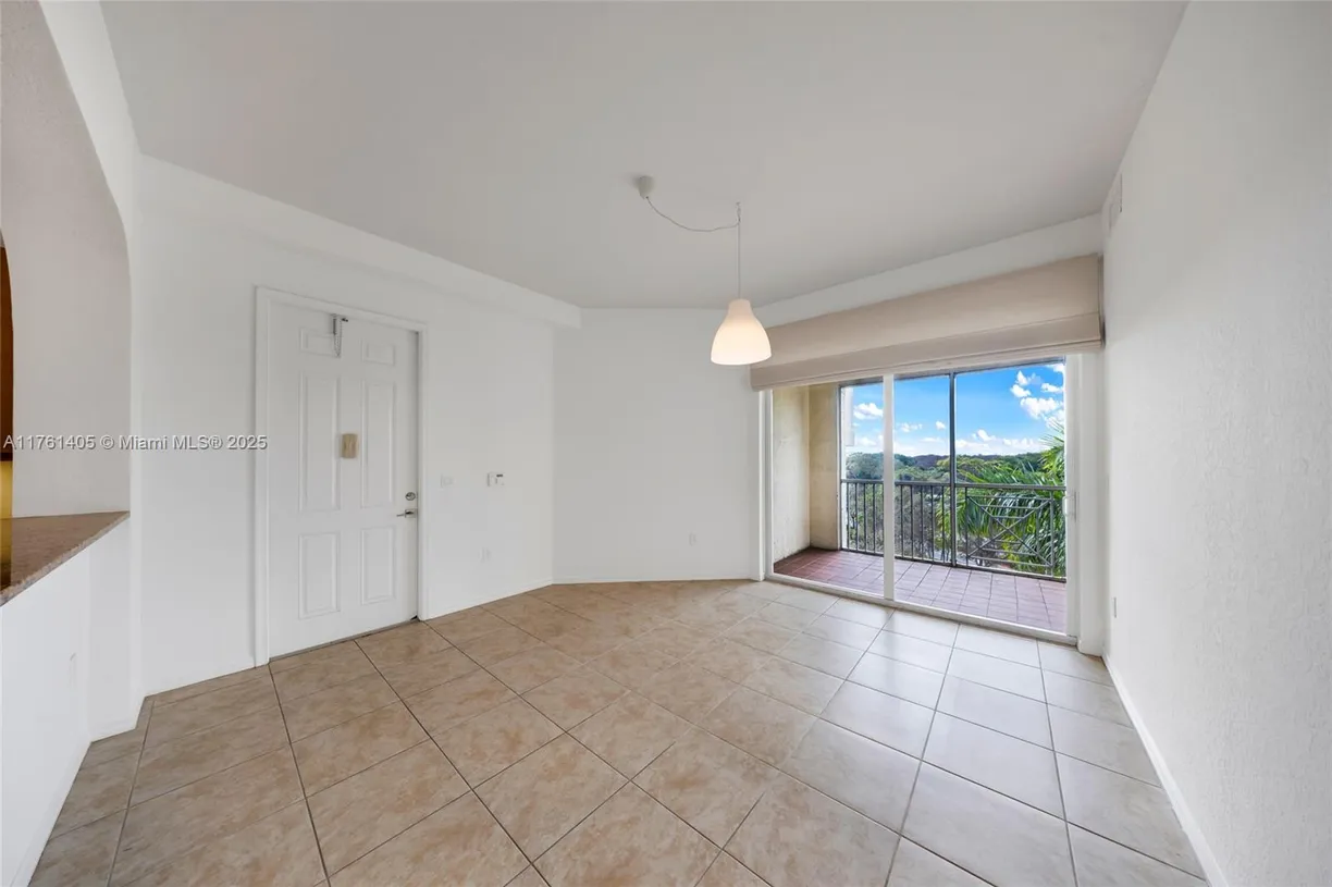 South Florida Real Estate | View 3600 Oaks Clubhouse Dr, 501 | Listing
