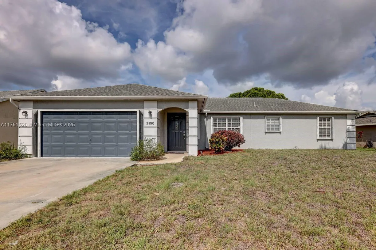 South Florida Real Estate | View 2150 SE Dolphin Rd | 3 Beds, 2 Baths