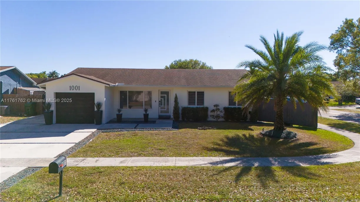 South Florida Real Estate | View 1001 NW 93rd Ter | 3 Beds, 2 Baths