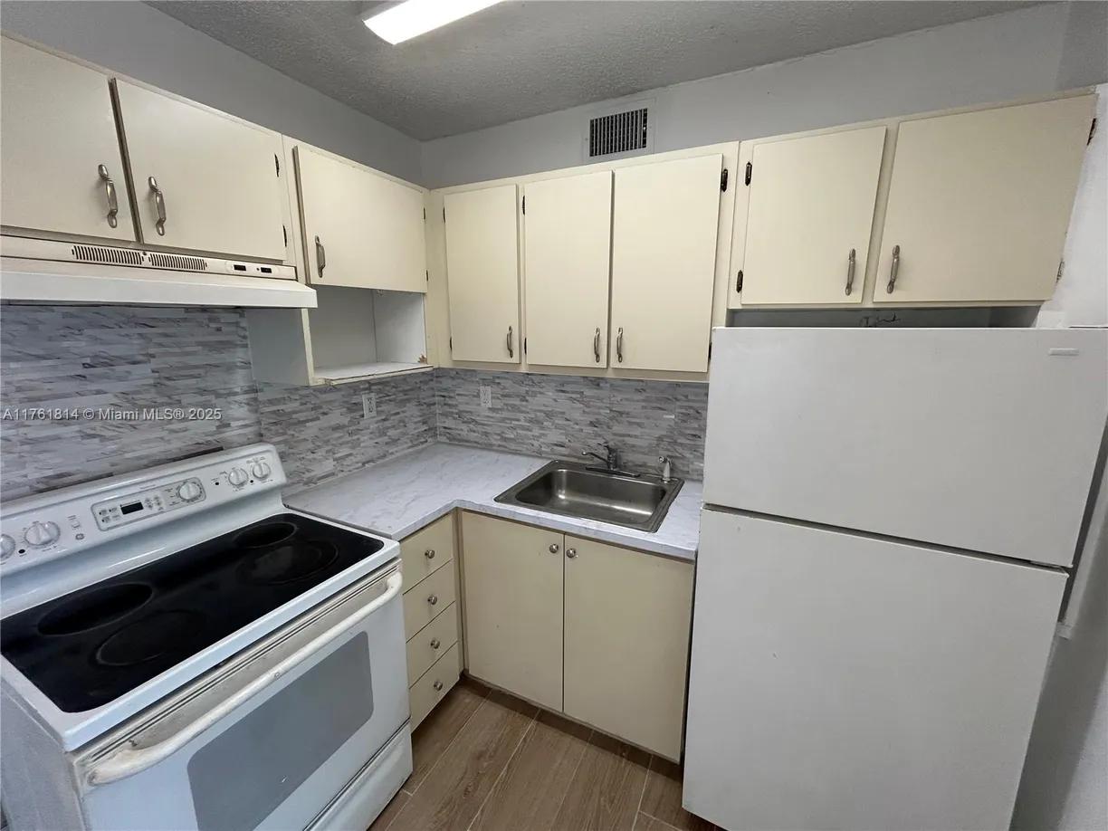 South Florida Real Estate | View 1126 SW 3rd St, 3 | 2 Beds, 1 Bath