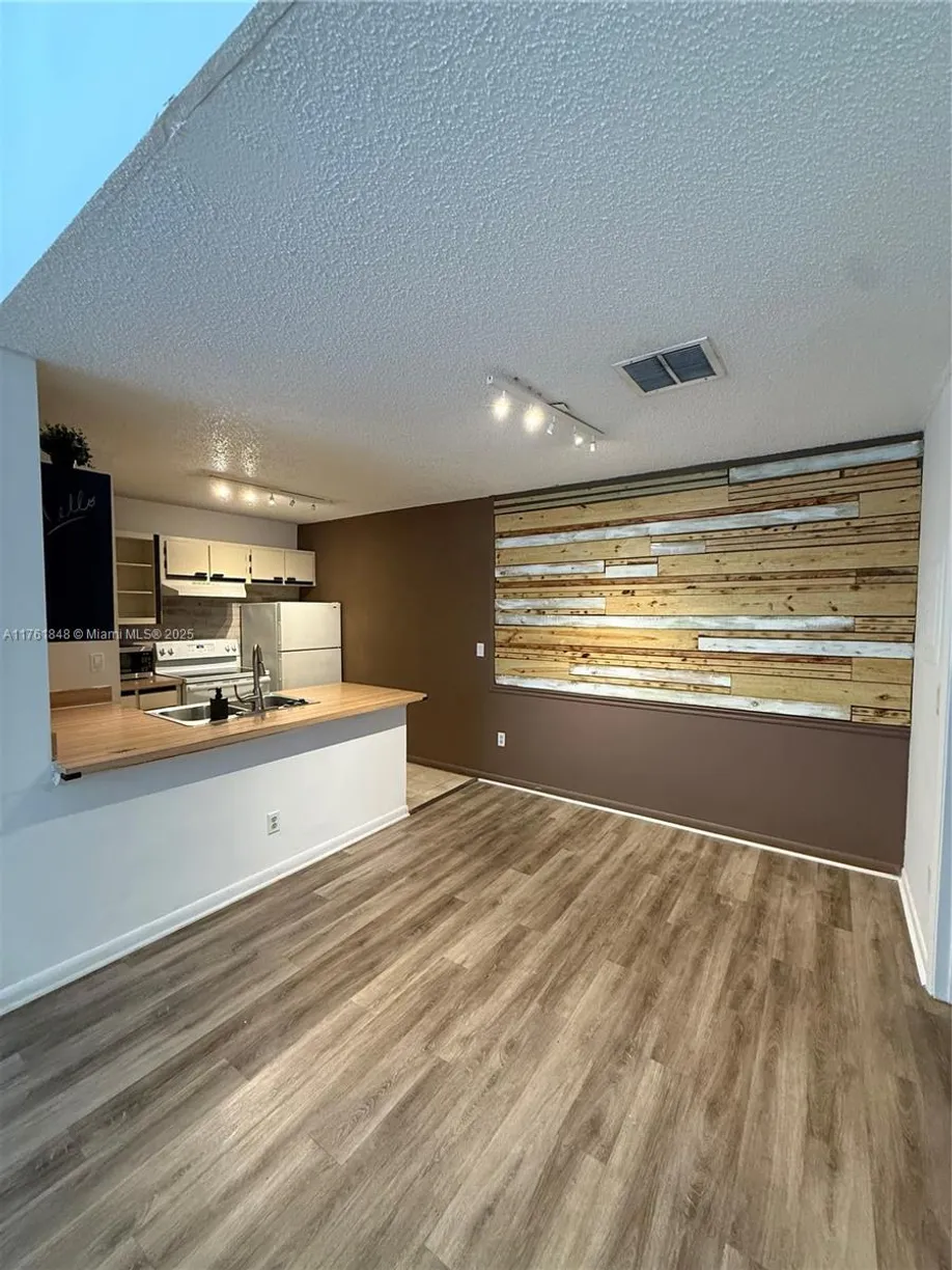 South Florida Real Estate | View 18328 NW 68th Ave, L | Listing