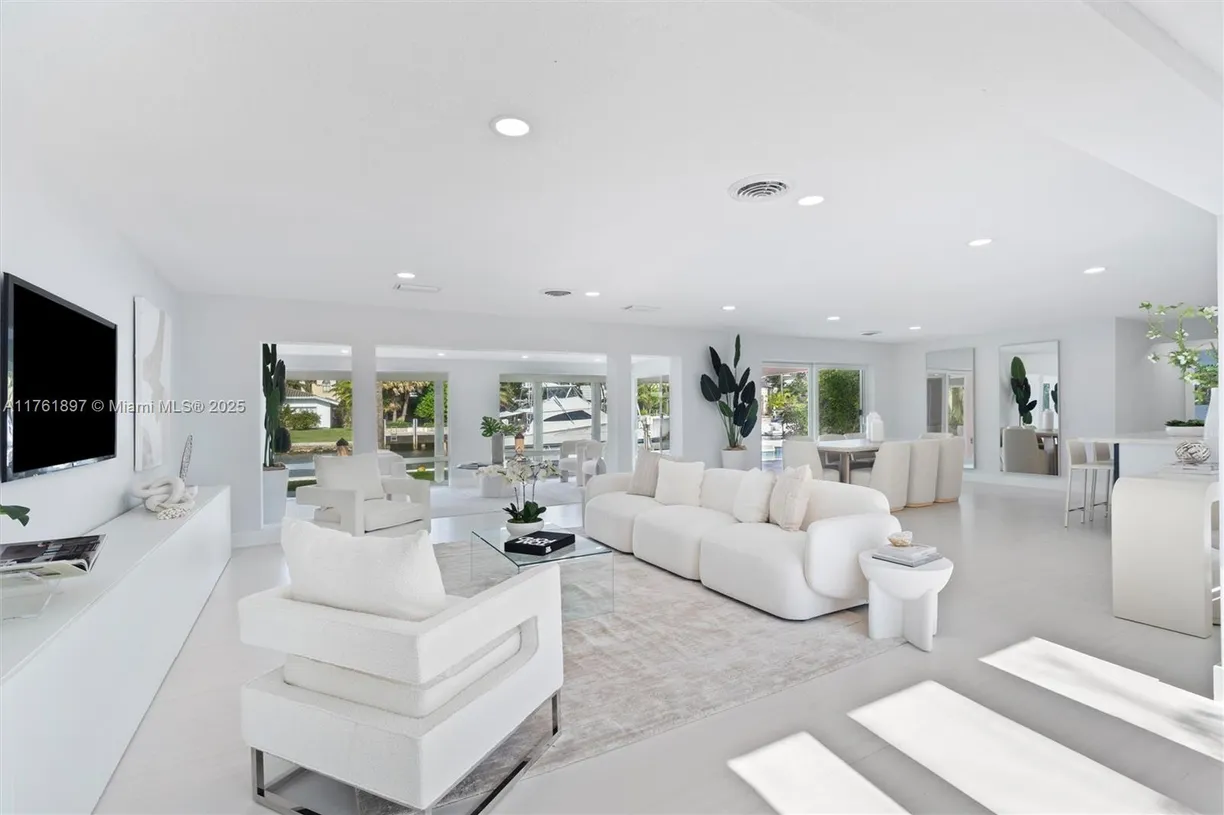 South Florida Real Estate | View 2797 NE 26th Ave | 4 Beds, 4 Baths