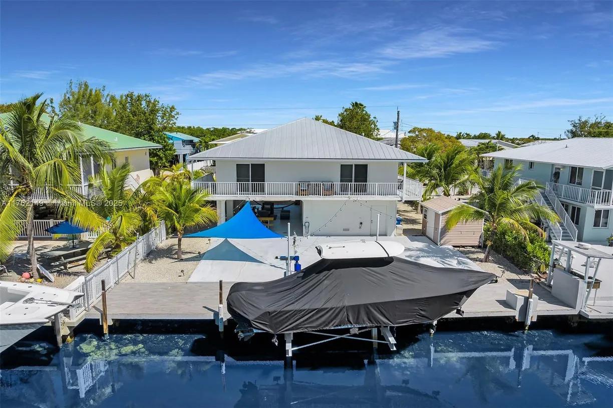 South Florida Real Estate | View 233 La Paloma Rd | 3 Beds, 2 Baths