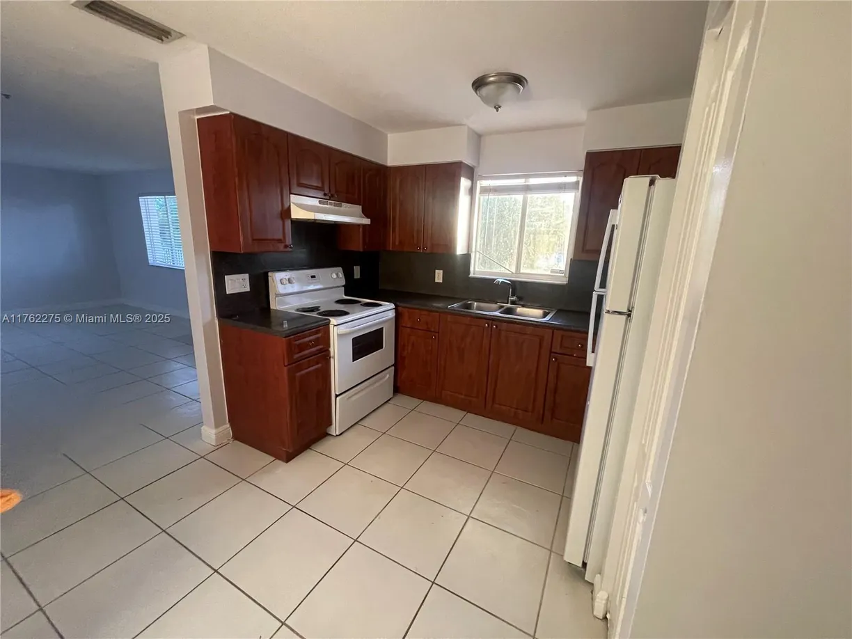 South Florida Real Estate | View 1453 SW 3rd St, 305 | Listing