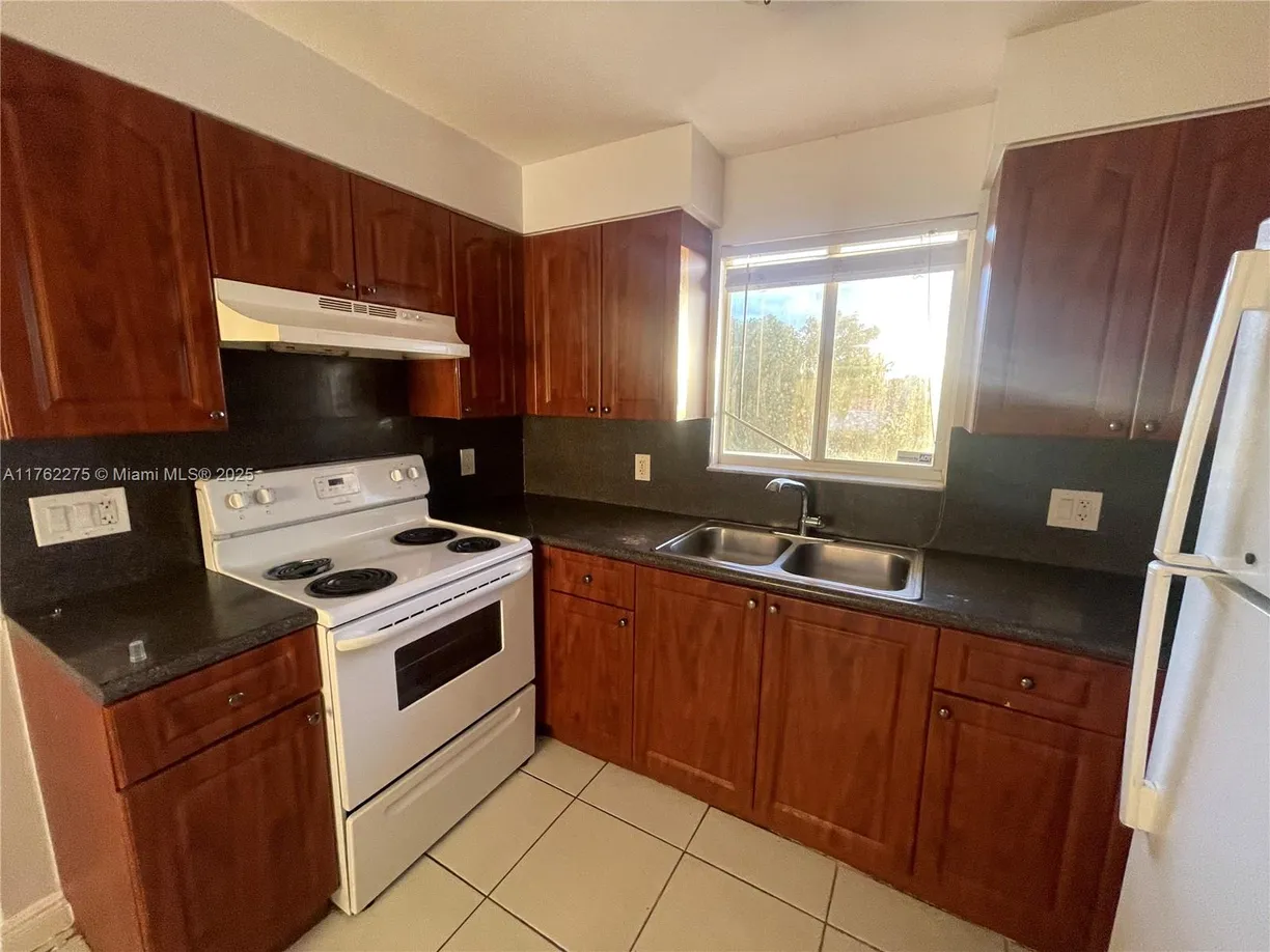 South Florida Real Estate | View 1453 SW 3rd St, 305 | 2 Beds, 1 Bath