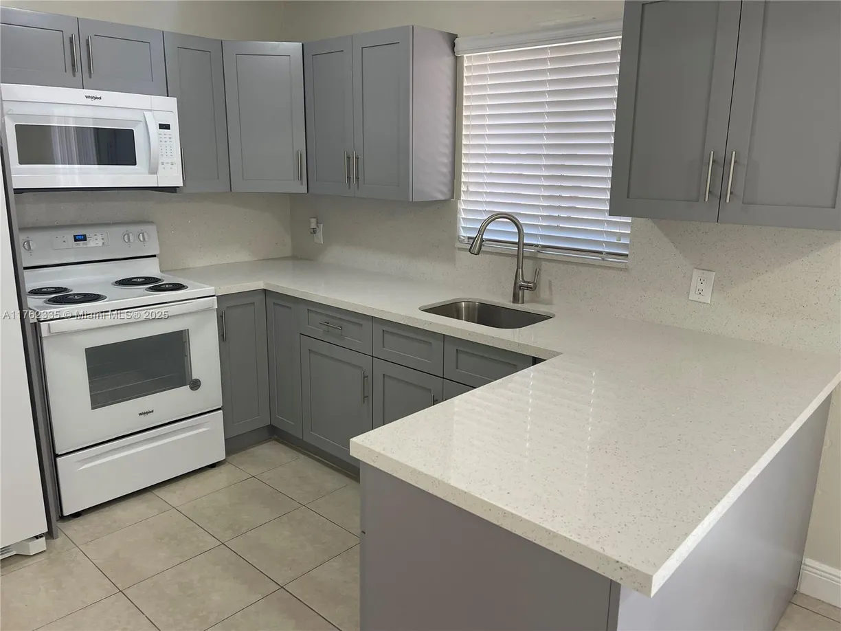 South Florida Real Estate | View 2432 W 54th Pl, 16 | 3 Beds, 2 Baths