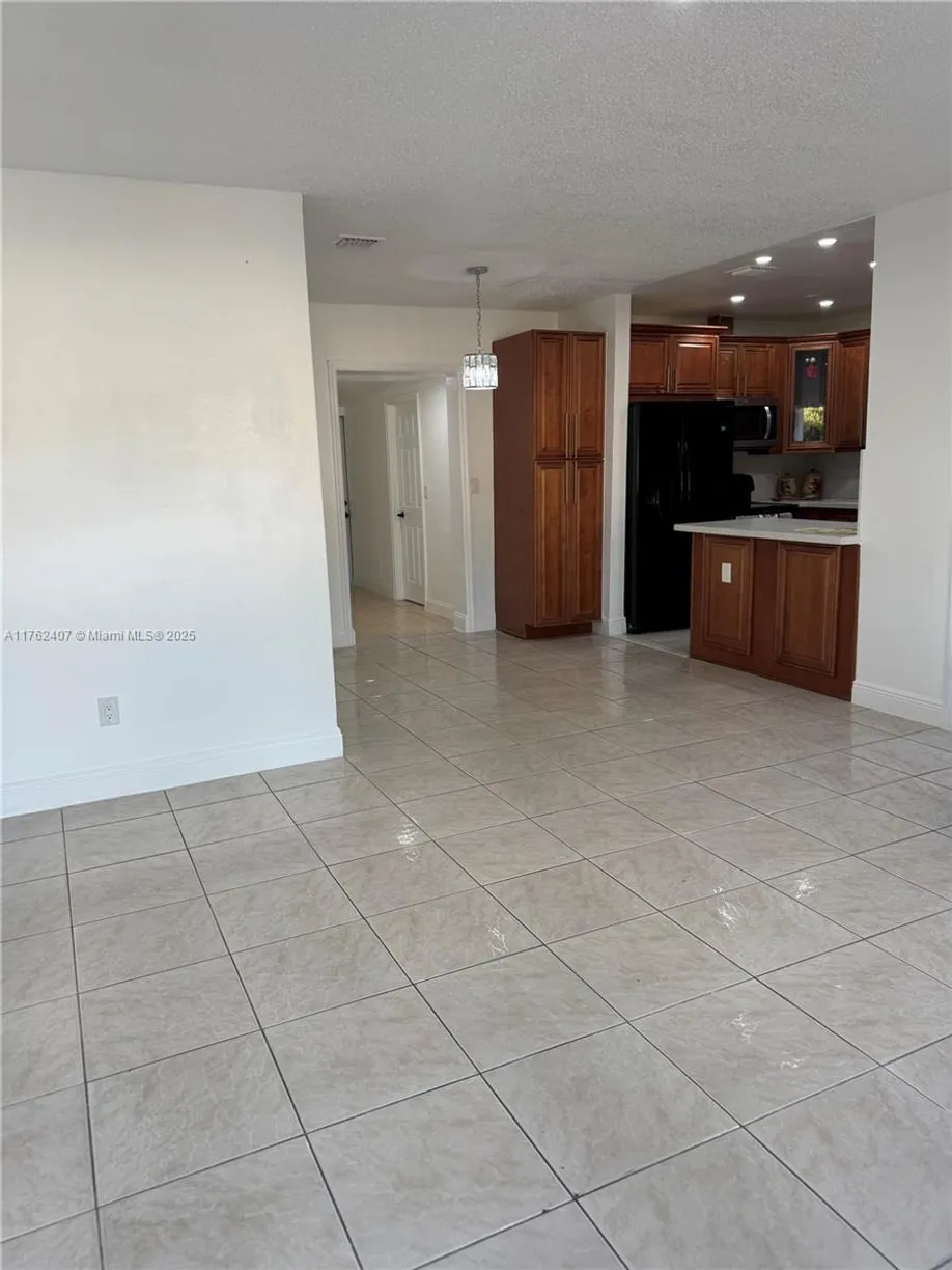 South Florida Real Estate | View 18600 NW 42nd Pl | Listing