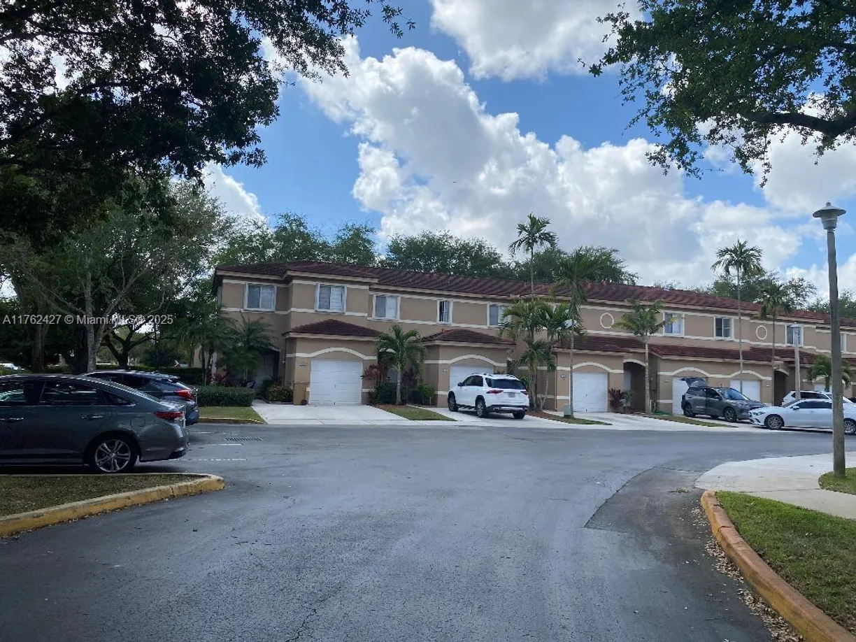 South Florida Real Estate | View 7690 S Southwood Cir | 4 Beds, 3 Baths