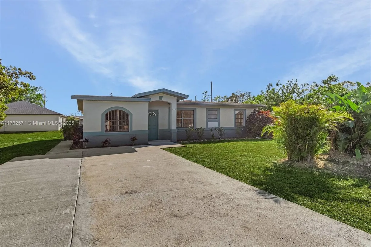 South Florida Real Estate | View 116 McKinley AVE | 3 Beds, 2 Baths