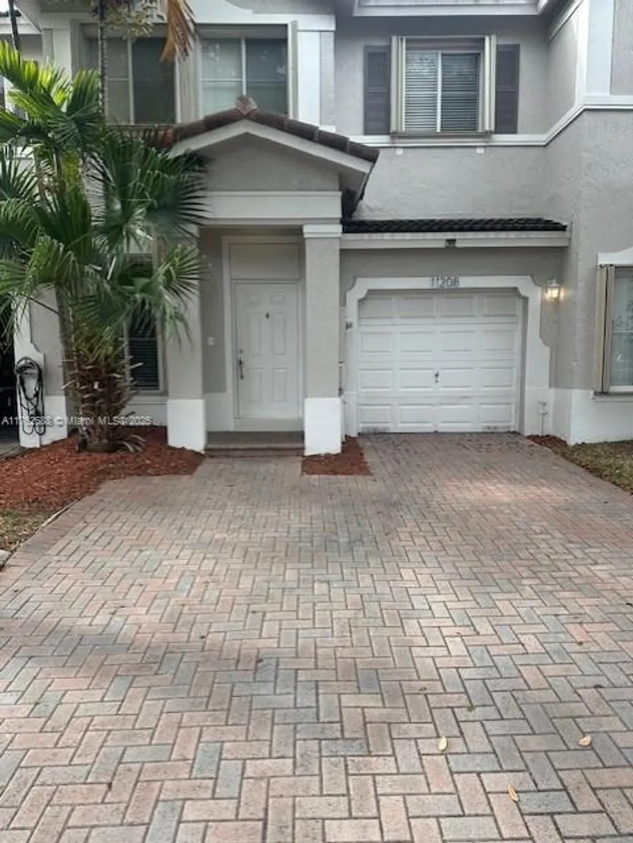 South Florida Real Estate | View 11208 NW 56 ST | 3 Beds, 2 Baths