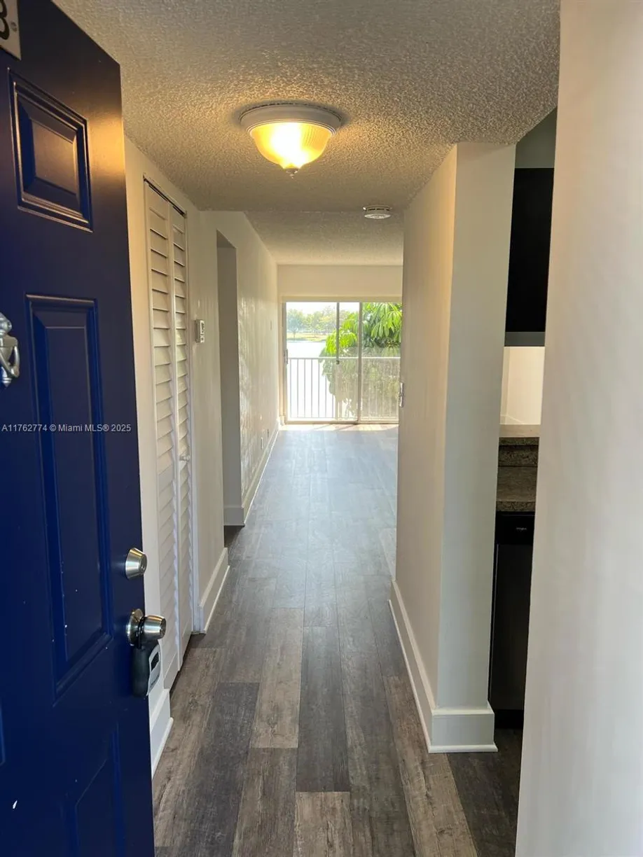 South Florida Real Estate | View 8720 N Sherman Cir, 203 | 2 Beds, 1 Bath