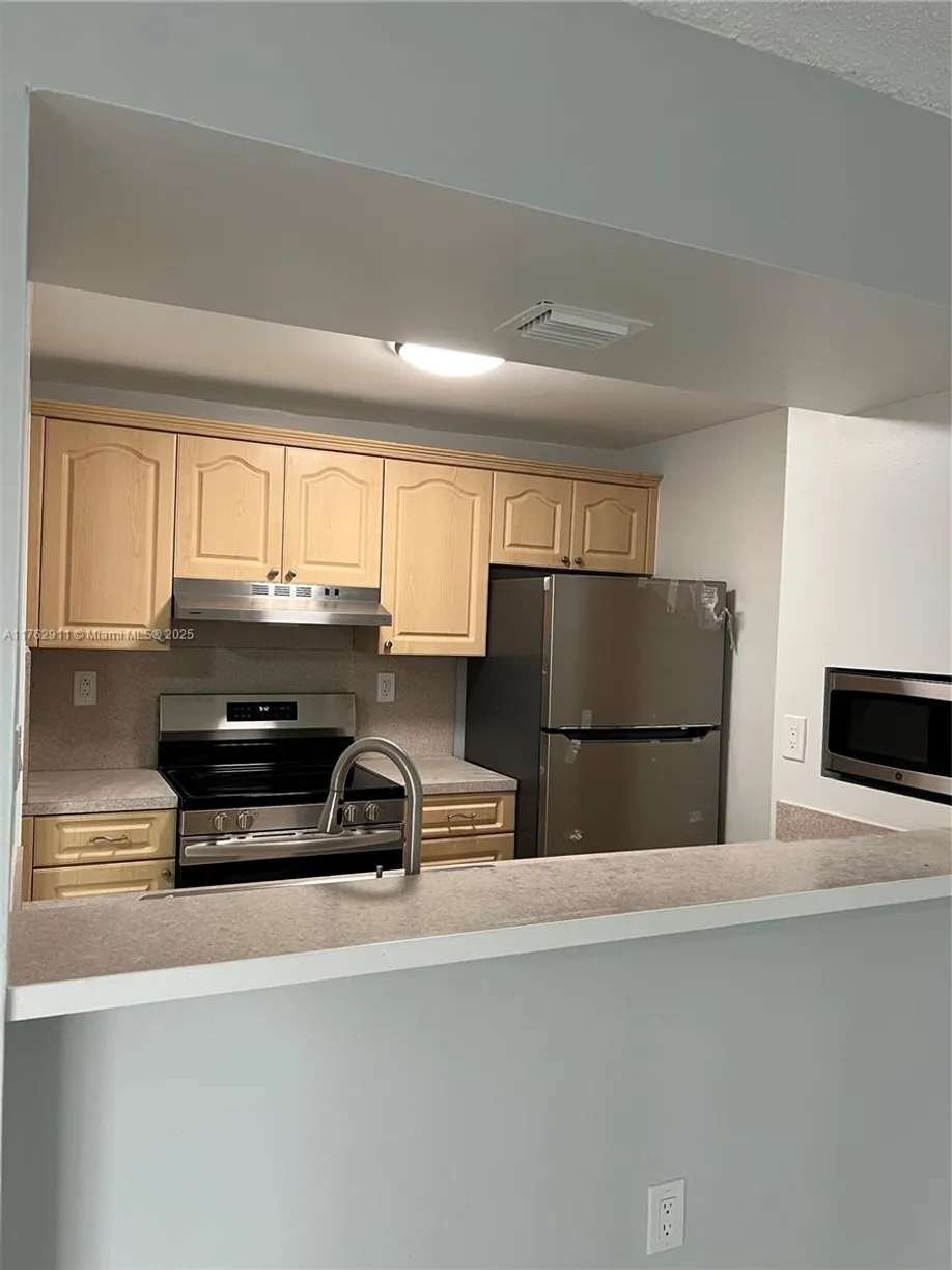 South Florida Real Estate | View 7125 NW 186th St, B408 | Listing