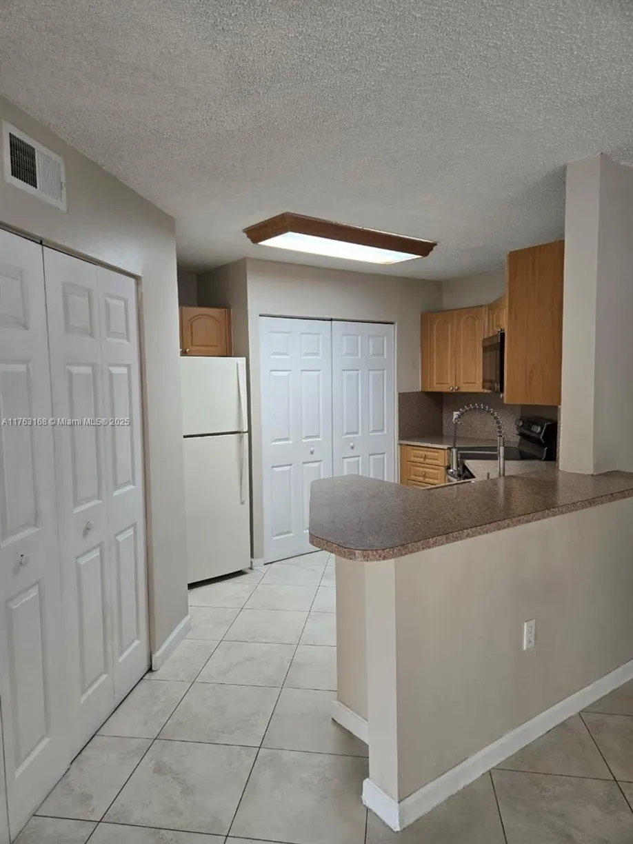 South Florida Real Estate | View 6272 NW 186th St, 110 | 2 Beds, 2 Baths