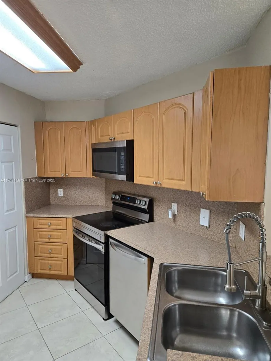 South Florida Real Estate | View 6272 NW 186th St, 110 | Listing