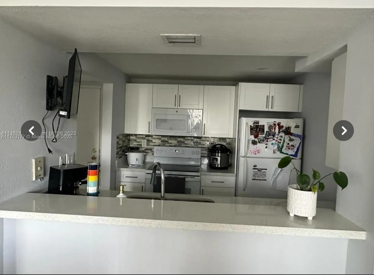 South Florida Real Estate | View 6955 NW 186th St, F409 | Listing