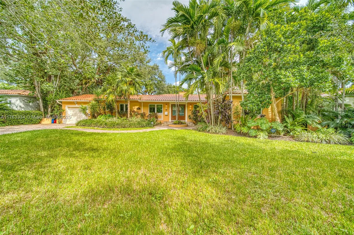 South Florida Real Estate | View 721 Catalonia Ave | 4 Beds, 3 Baths