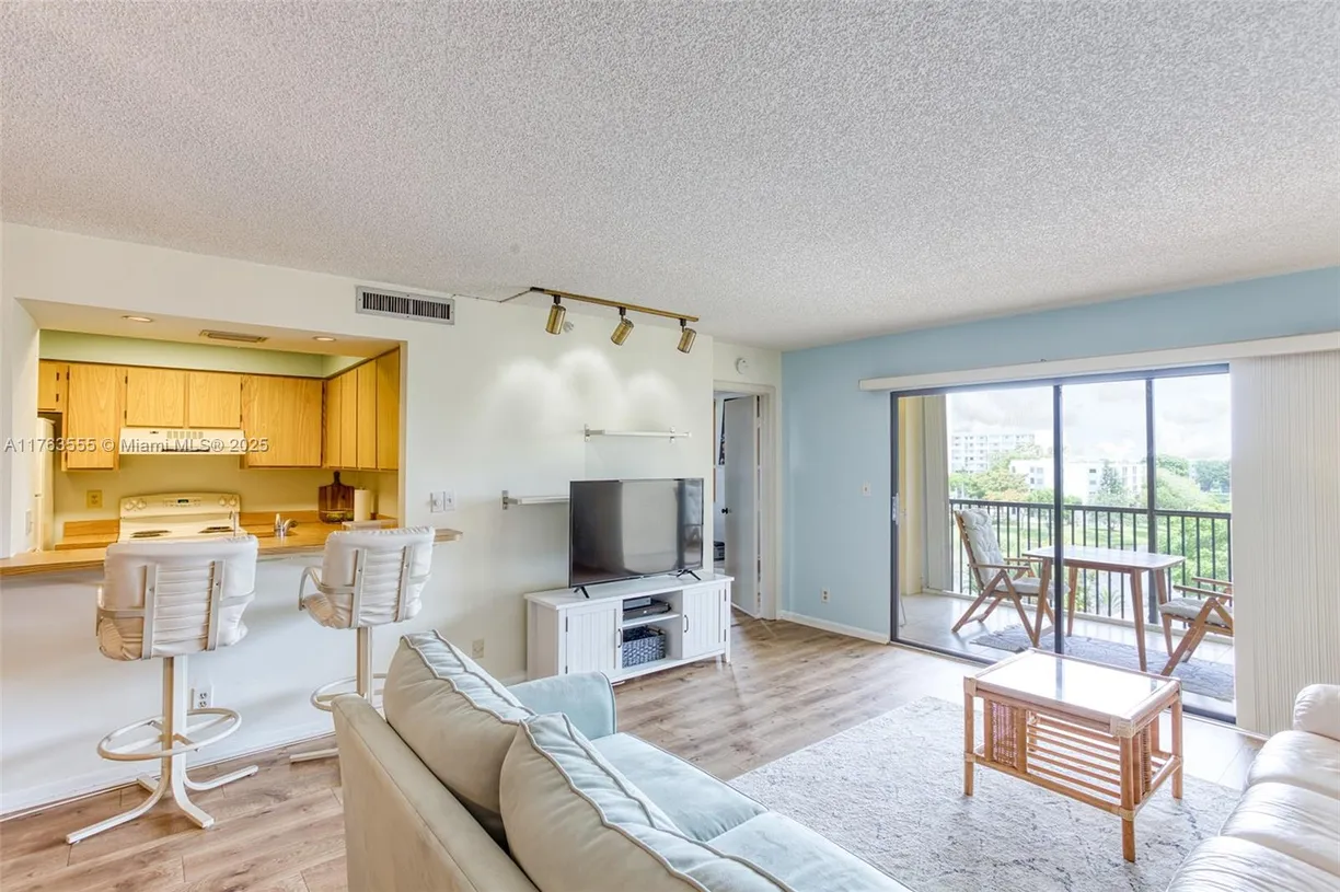 South Florida Real Estate | View 2205 S Cypress Bend Dr, 604 | Listing