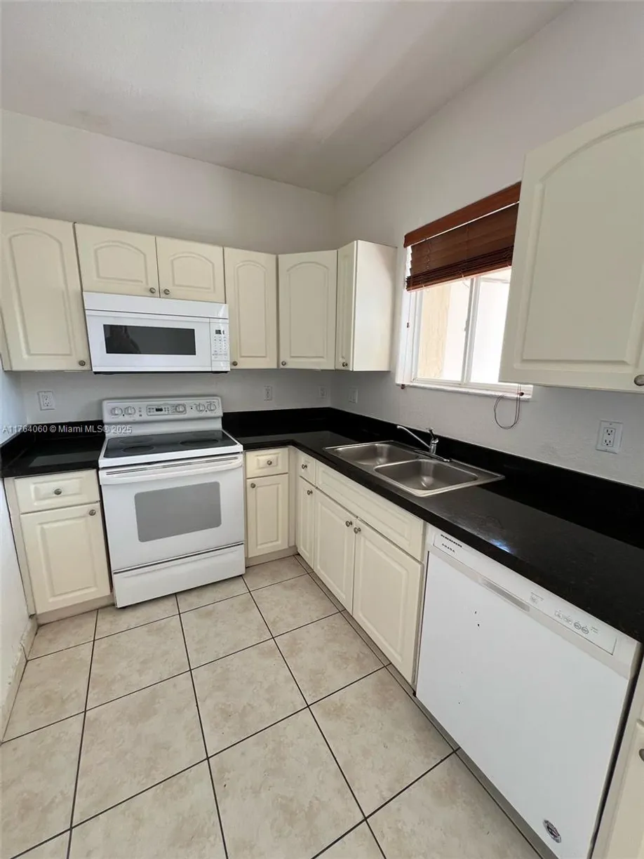 South Florida Real Estate | View 7200 NW 174th Ter, 202 | Listing
