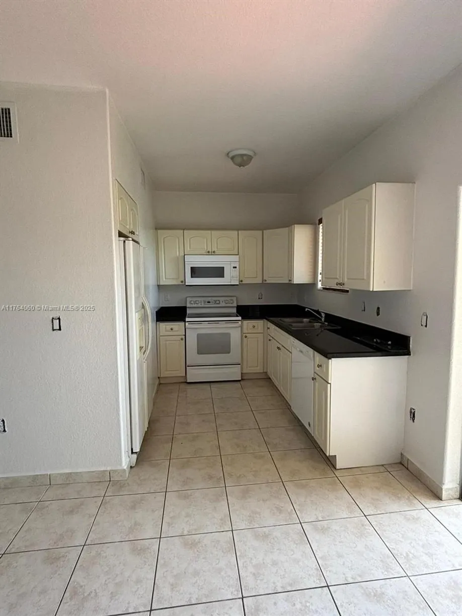 South Florida Real Estate | View 7200 NW 174th Ter, 202 | Listing