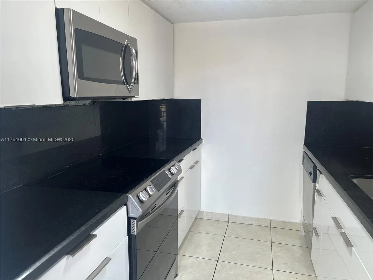 South Florida Real Estate | View 1340 W 41st St, 101 | 3 Beds, 3 Baths