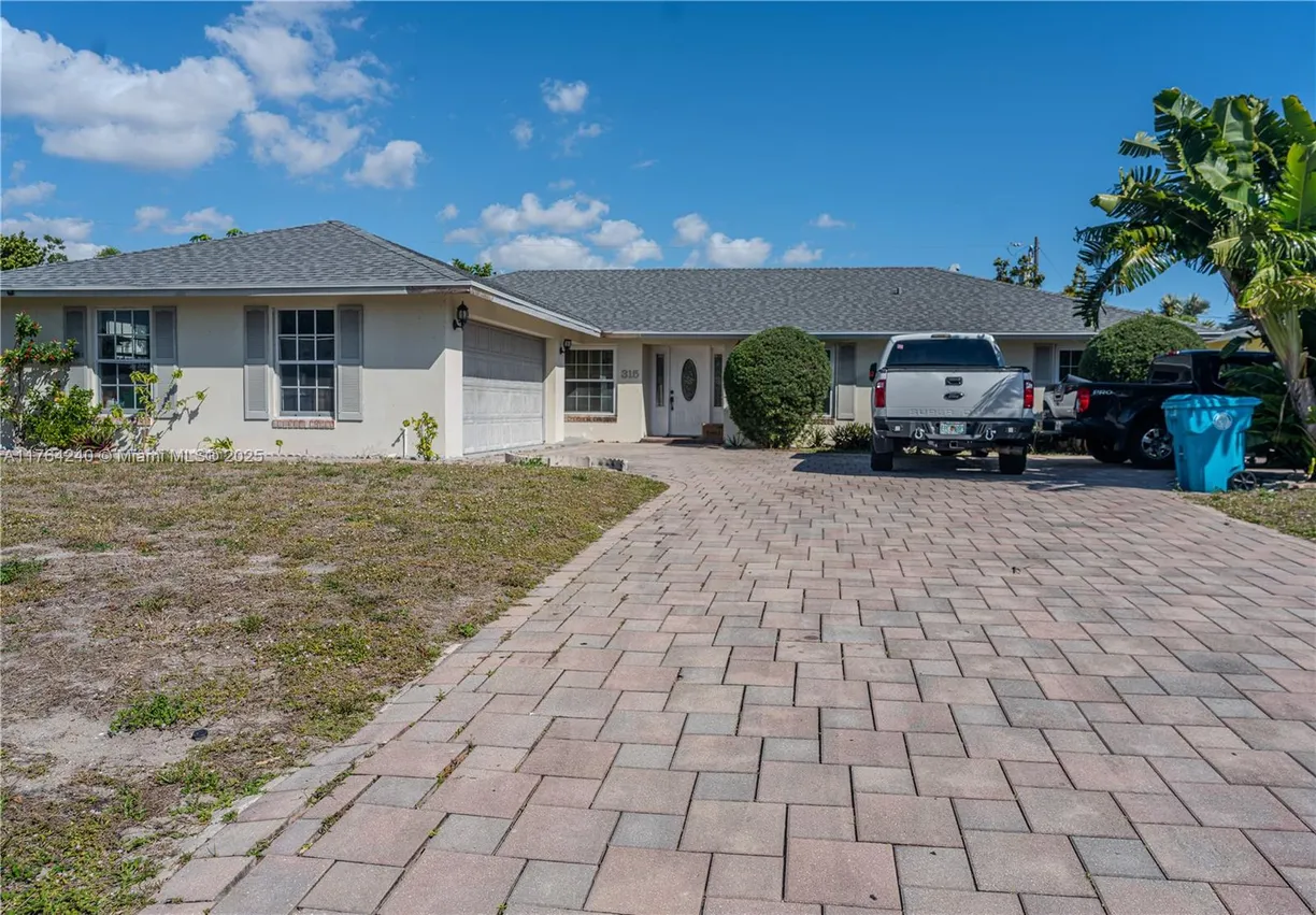 South Florida Real Estate | View 315 SW 12th Ave | 4 Beds, 2 Baths