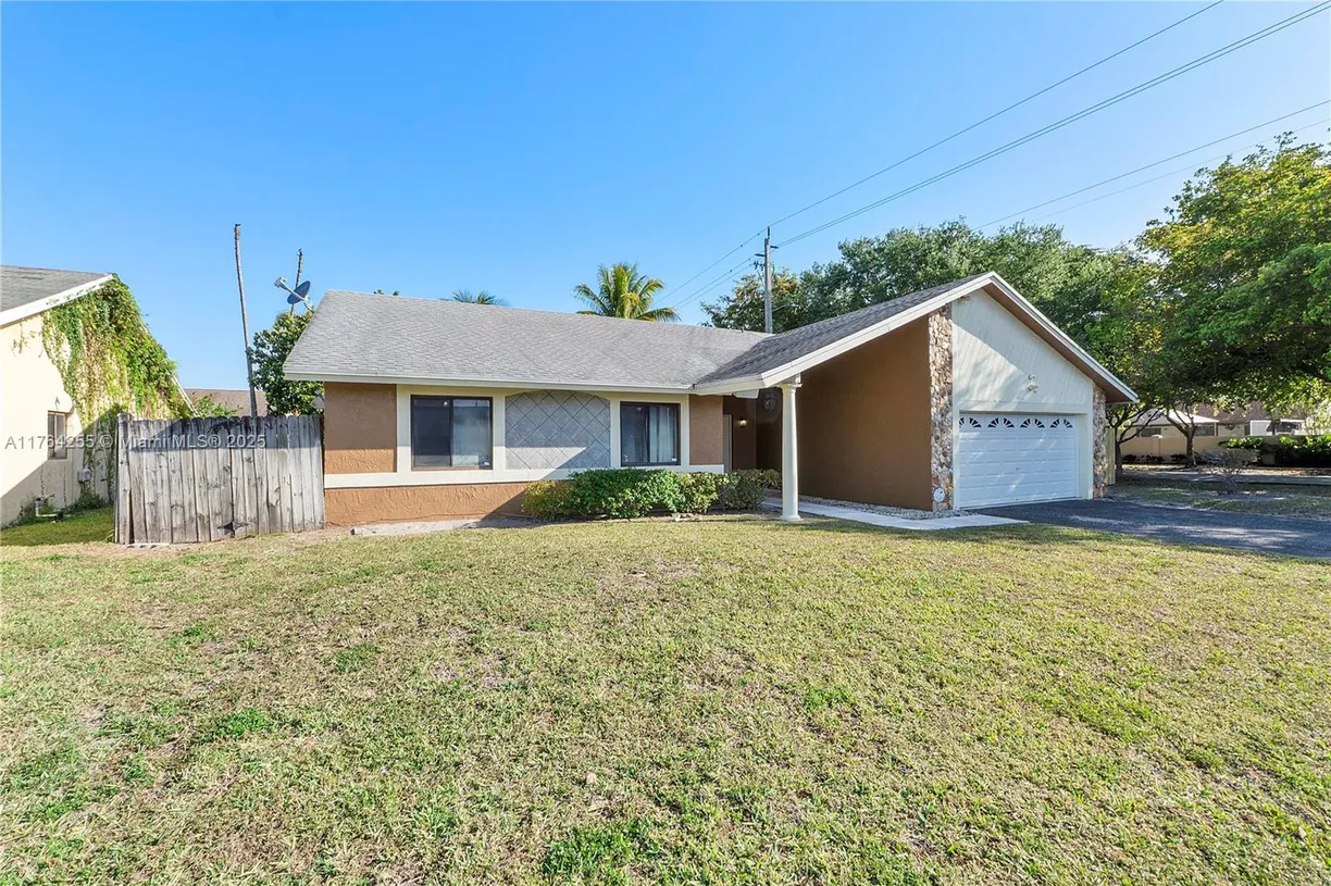 South Florida Real Estate | View 8201 NW 53rd St | 3 Beds, 2 Baths