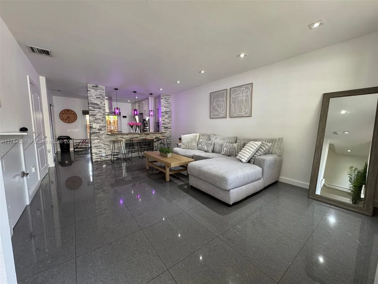 South Florida Real Estate | View 316 E 4th St, 1 | 3 Beds, 2 Baths