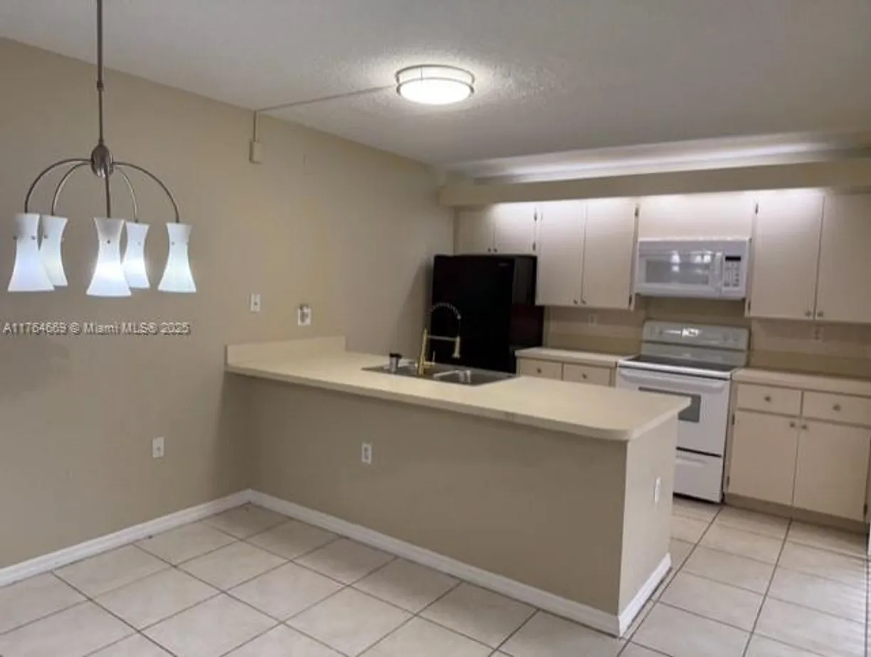 South Florida Real Estate | View 7617 76th Way | Listing