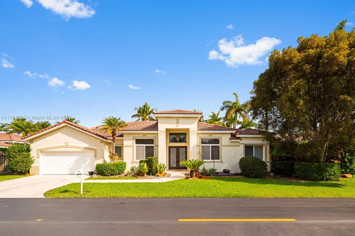 South Florida Real Estate | View 8427 SW 138th Ter | 4 Beds, 3 Baths