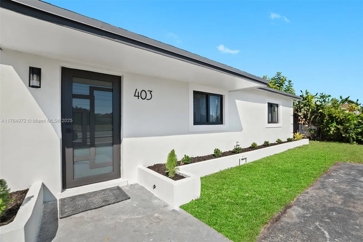 South Florida Real Estate | View 403 SW 71st Ave | 4 Beds, 2 Baths