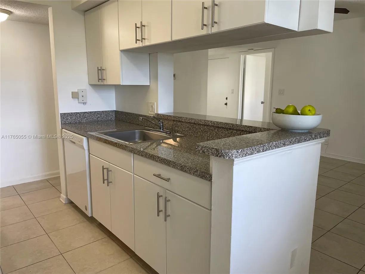 South Florida Real Estate | View 5740 Rock Island Rd, 282 | 2 Beds, 1 Bath