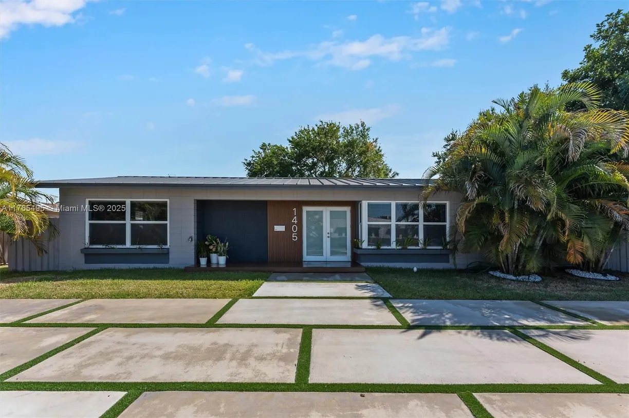 South Florida Real Estate | View 1405 N 46th Avenue | 4 Beds, 2 Baths