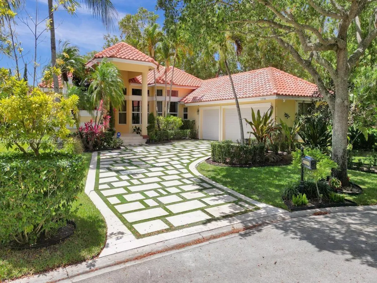 South Florida Real Estate | View 12736 NW 18th Pl | 4 Beds, 3 Baths