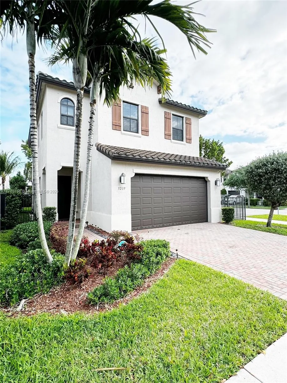 South Florida Real Estate | View 3209 W 98th Pl, 3209 | Listing
