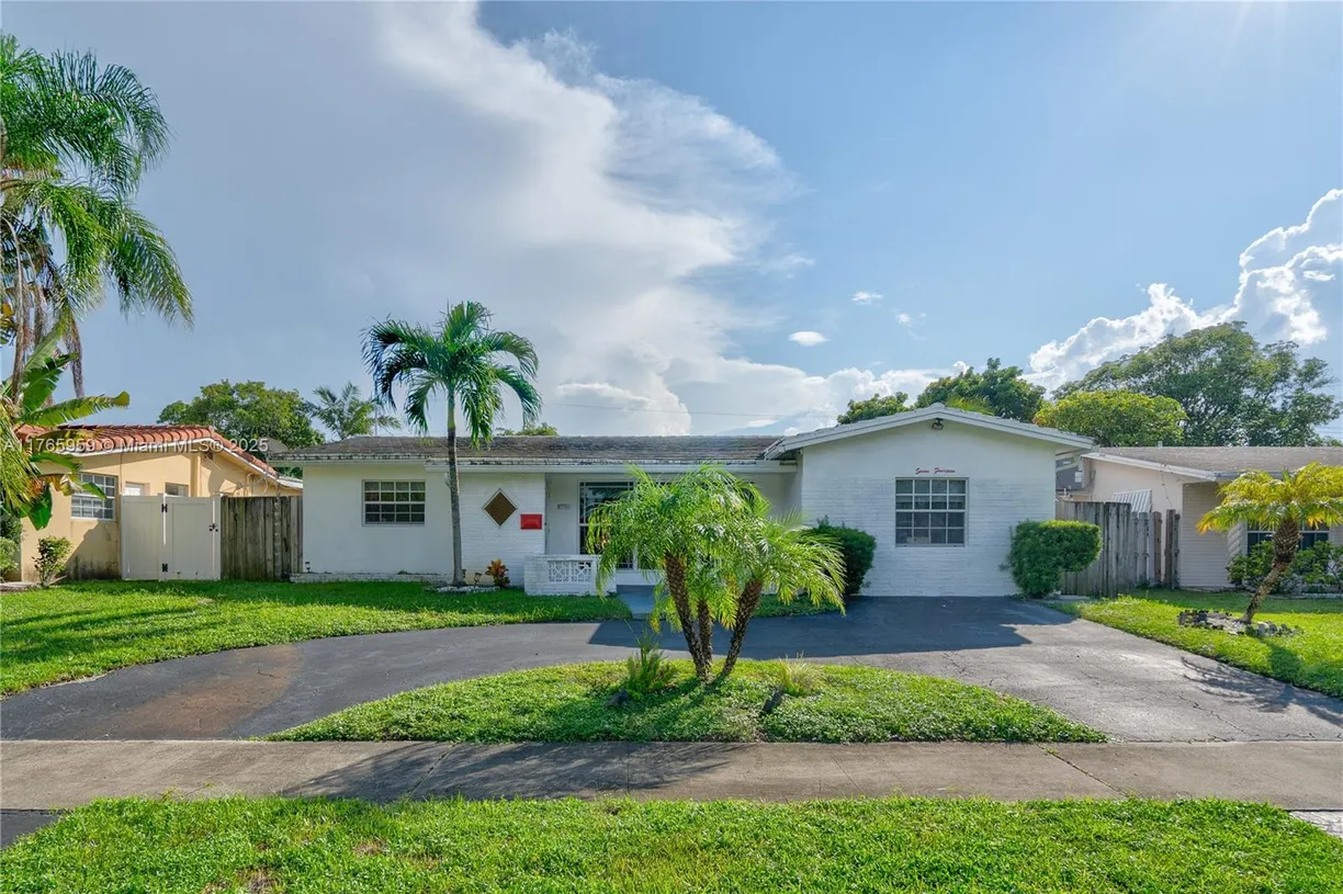 South Florida Real Estate | View 714 S Rainbow Dr | 4 Beds, 2 Baths