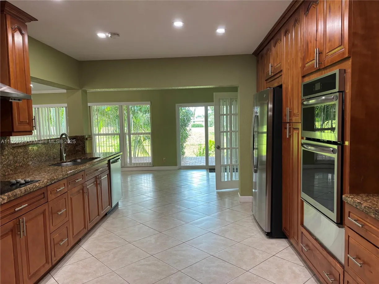 South Florida Real Estate | View 5115 Yellow Pine Ln | 4 Beds, 2 Baths
