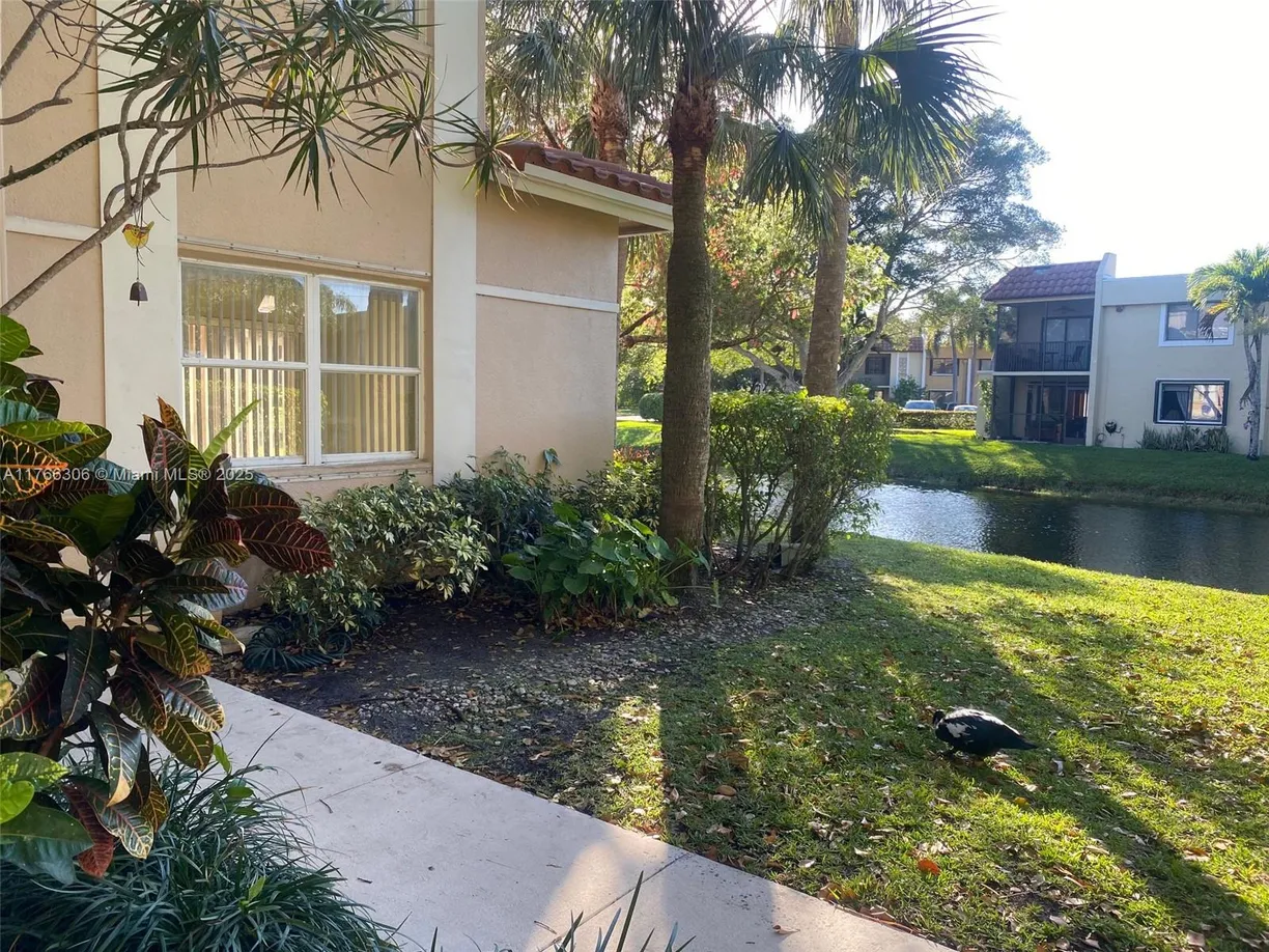 South Florida Real Estate | View 555 Racquet Club Rd, 27 | 3 Beds, 2 Baths