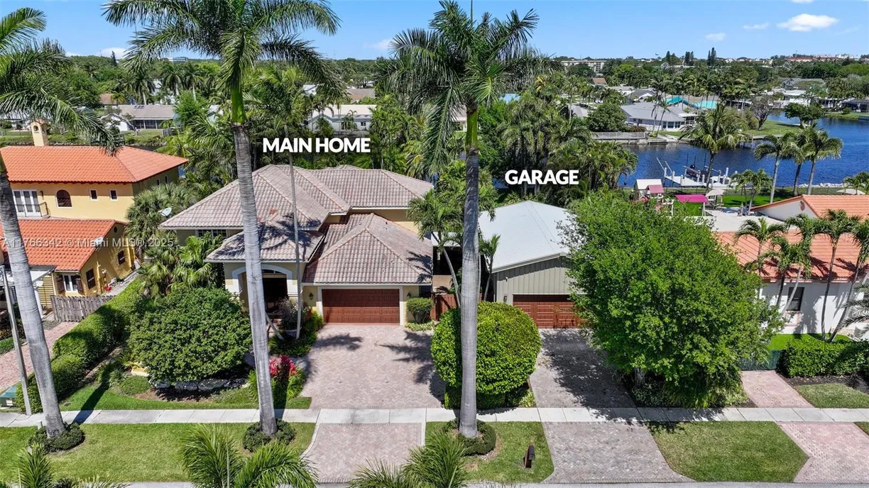 South Florida Real Estate | View 389 Oregon Ln | 4 Beds, 2 Baths