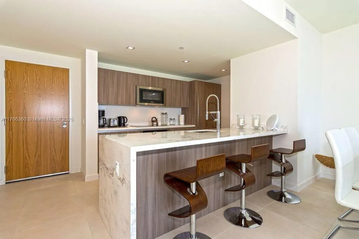 South Florida Real Estate | View 401 N Birch Rd, 1111 | Listing
