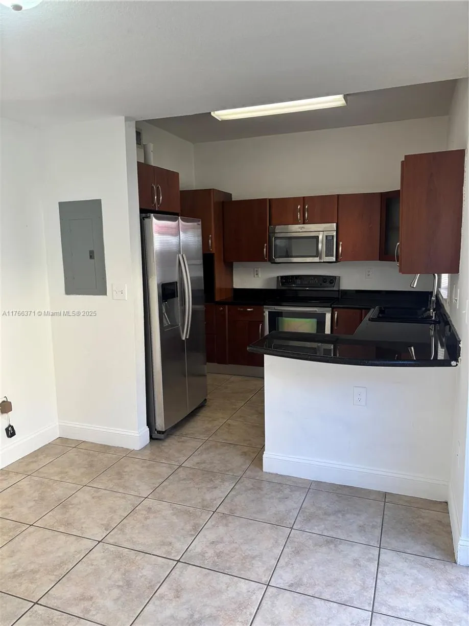 South Florida Real Estate | View 7427 NW 181st Ter, 7427 | Listing