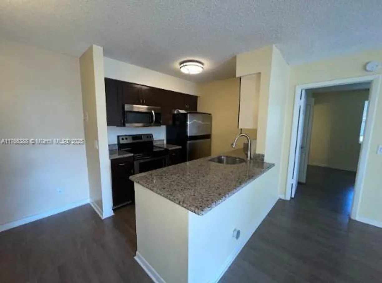 South Florida Real Estate | View 10428 NW 8th St, 204 | 2 Beds, 2 Baths