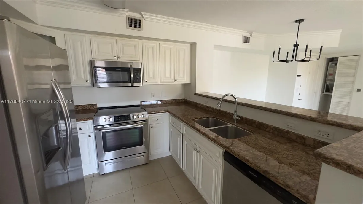 South Florida Real Estate | View 12166 Saint Andrews Pl, 106 | Listing