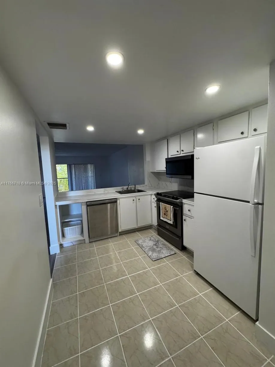 South Florida Real Estate | View 6575 W Oakland Park Blvd, 303 | Listing