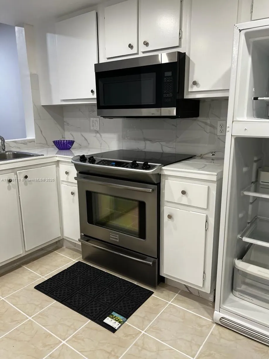 South Florida Real Estate | View 6575 W Oakland Park Blvd, 303 | Listing