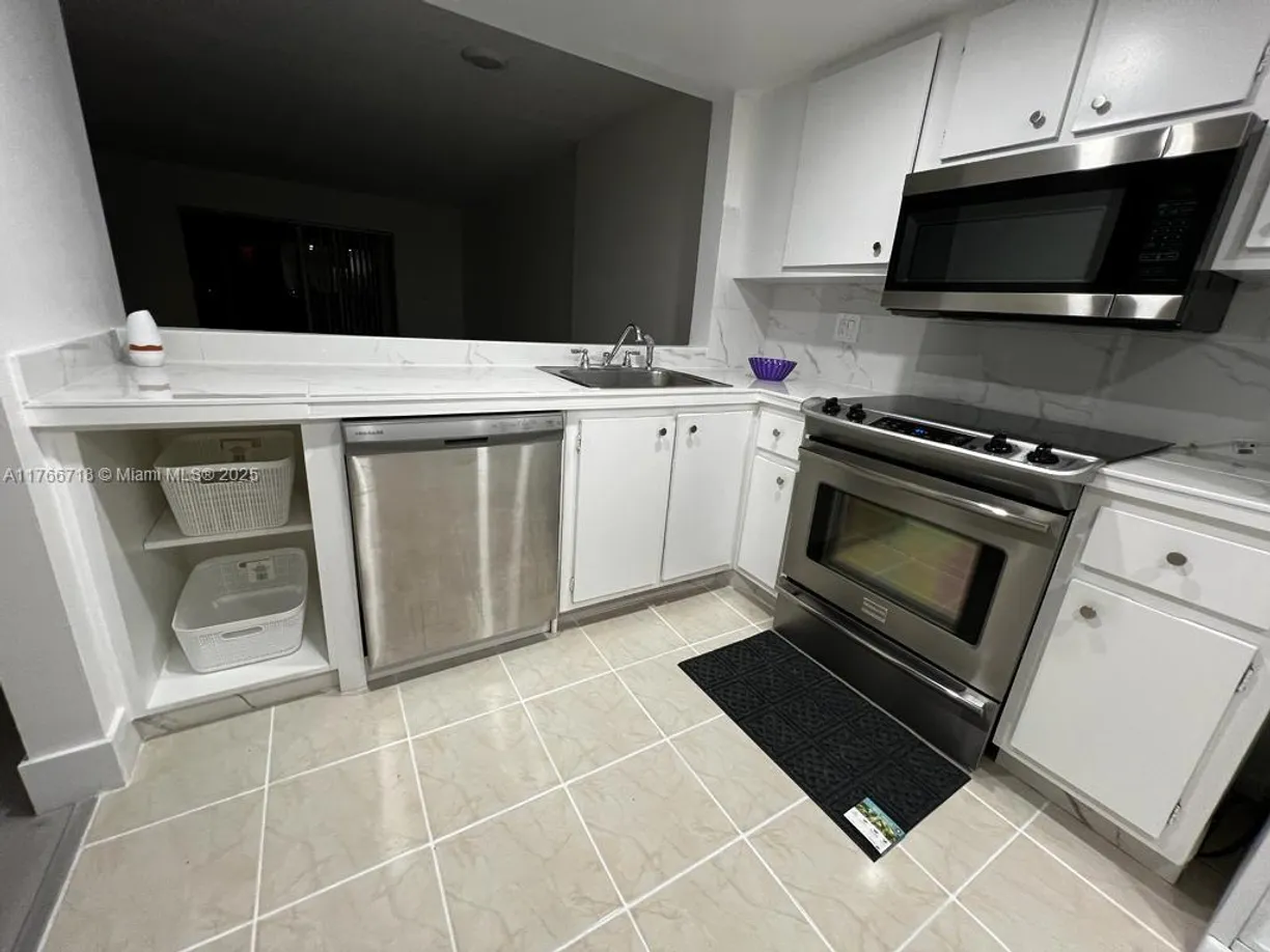 South Florida Real Estate | View 6575 W Oakland Park Blvd, 303 | 2 Beds, 2 Baths