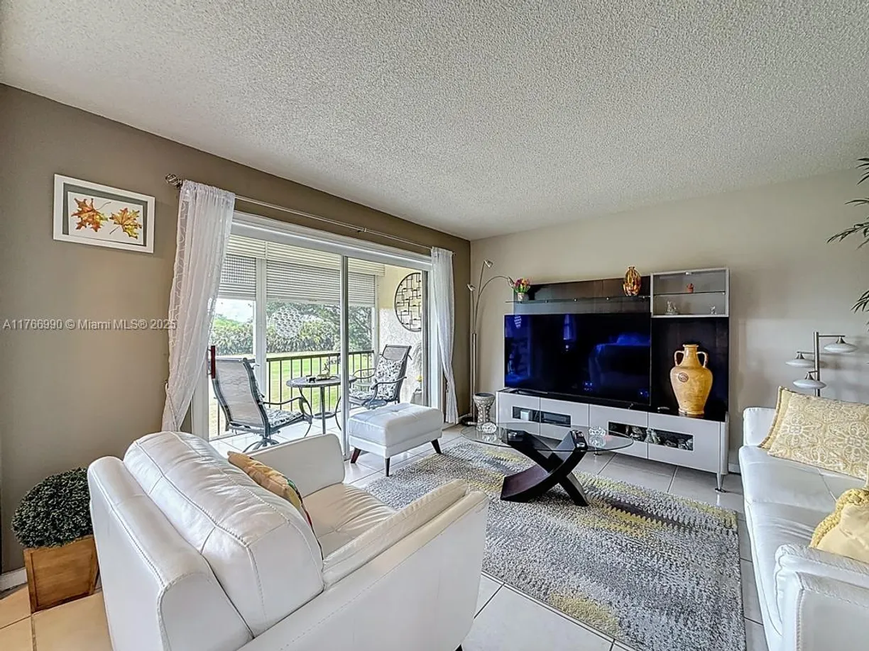 South Florida Real Estate | View 9411 N Hollybrook Lake Dr, 304 | Listing