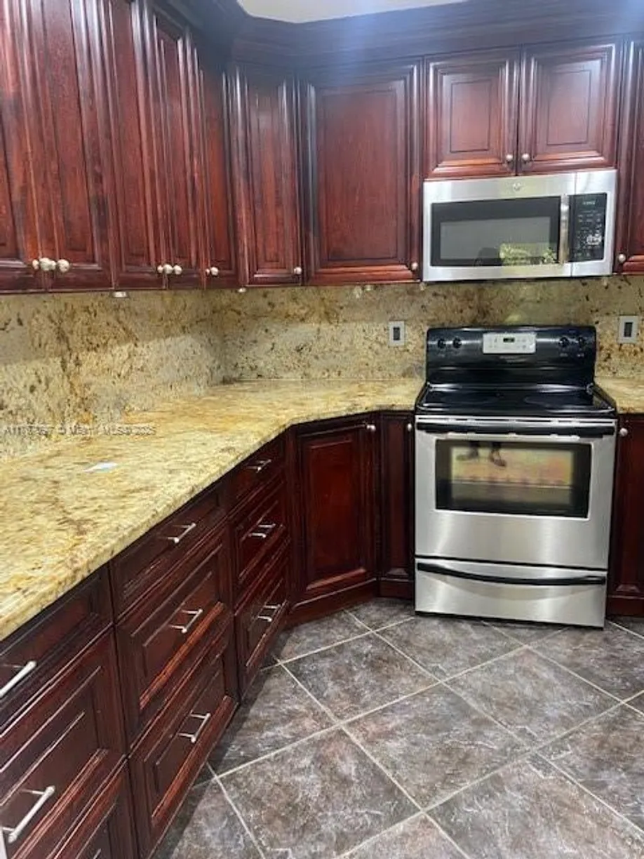 South Florida Real Estate | View 3933 Cocoplum Cir, 3518 | 2 Beds, 2 Baths